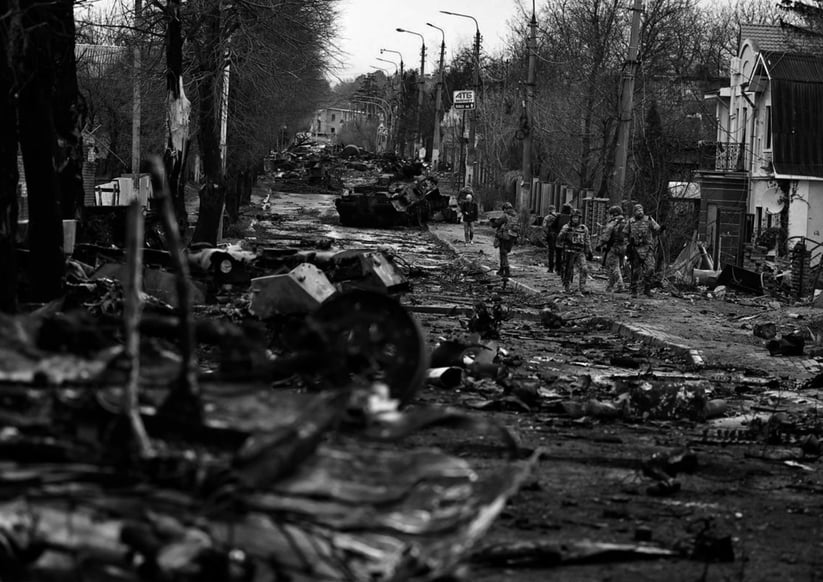 Finance4Learning |  Bucha / Kyiv street littered with burned-out tanks